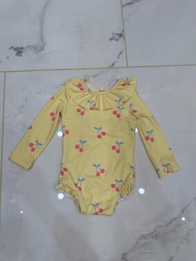 Baby Cotton on swimsuit